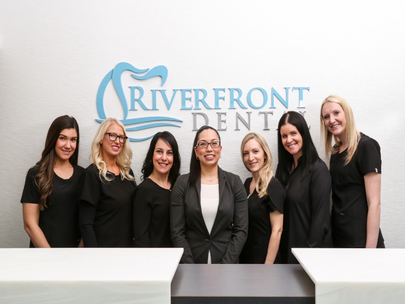 Dr Kim fo Riverfront Dental Cambridge with her team