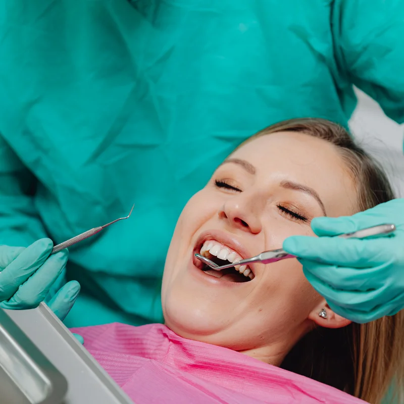 Patient receiving dental restoration treatment at Riverfront Dental Cambridge