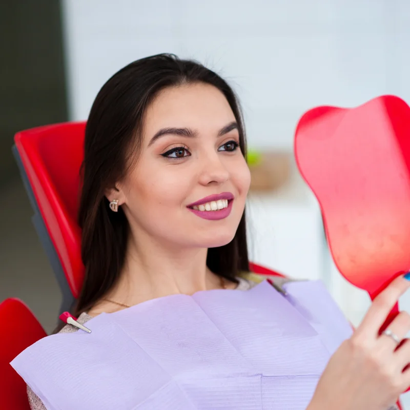 Female patient receiving cosmetic dental treatment at Riverfront Dental in Cambridge Ontario